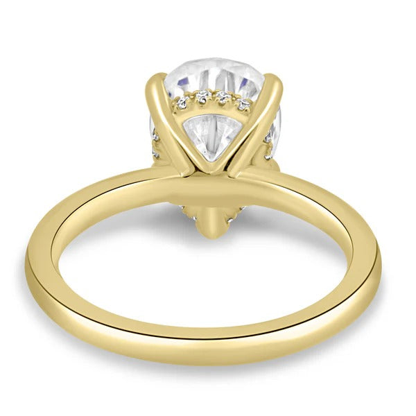 Five claw pear cut diamond solitaire hidden halo engagement ring