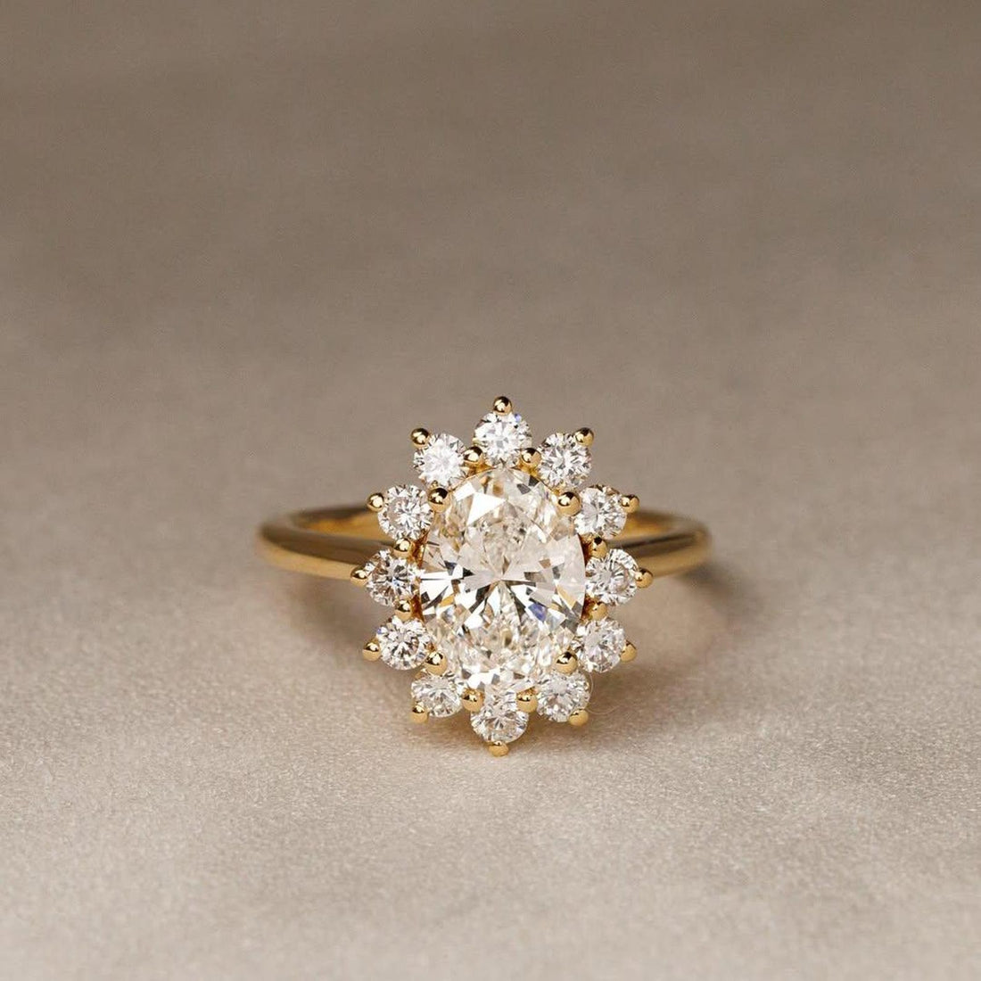 Sunburst halo oval lab grown diamond anniversary ring detail