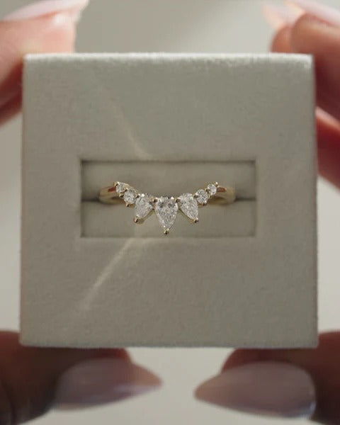 Accent stones curved diamond wedding band