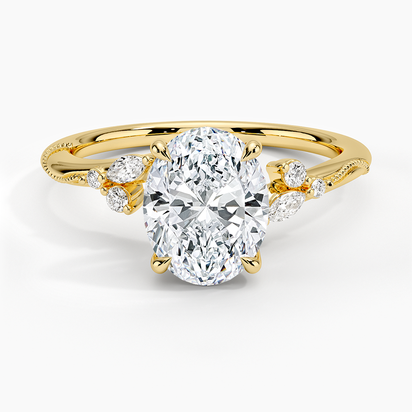 Oval cut lab grown diamond ring with marquise sprays on a milgrain vine band in yellow gold, top view