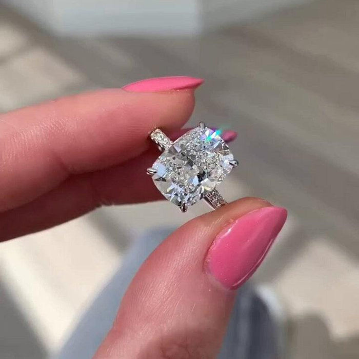 Elongated cushion cut lab grown diamond pave ring angled view