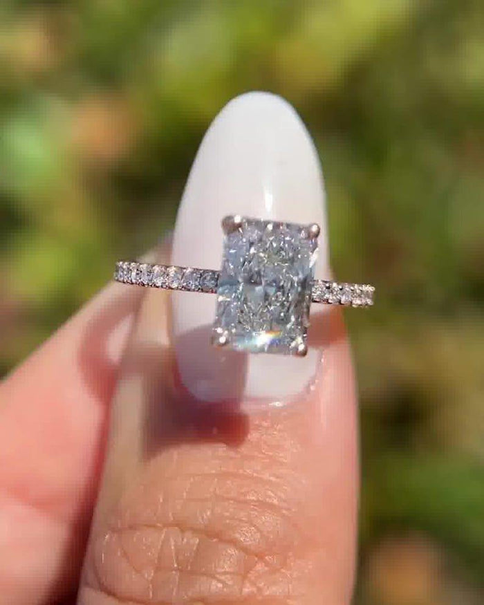 Radiant cut lab grown diamond pave shoulders close up