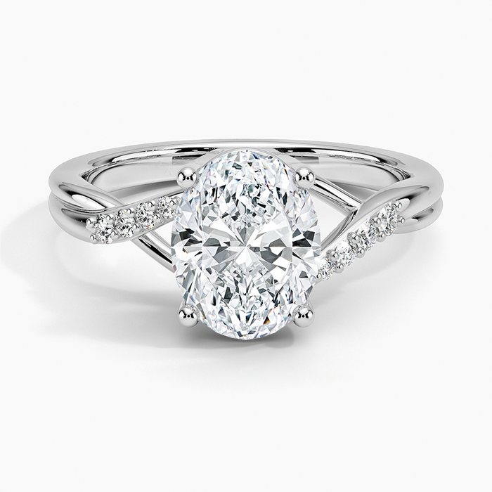 Oval cut lab grown diamond ring with crossover shoulders and a diagonal pave sweep in white gold, top view