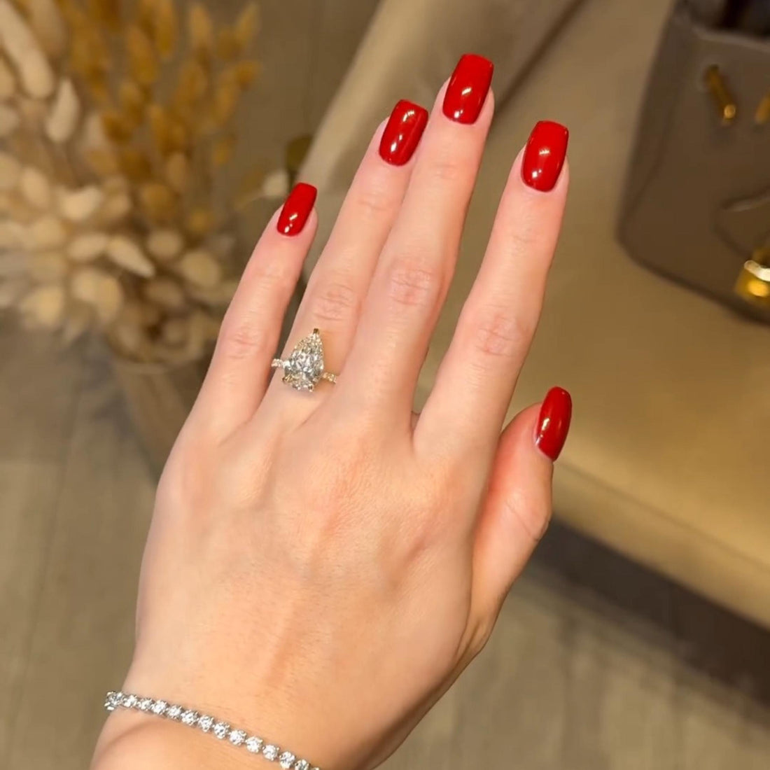 Pear cut lab grown diamond hidden halo ring with pave band in yellow gold