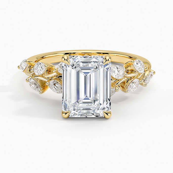 Emerald cut lab grown diamond vine ring with marquise leaf cluster accents in yellow gold, top view