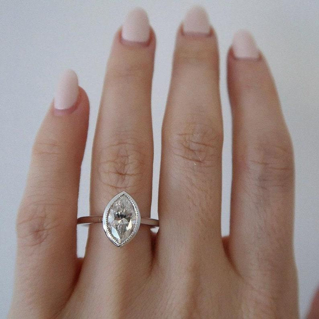 Marquise cut lab grown diamond milgrain bezel engagement ring