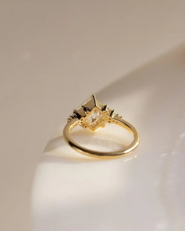 Princess cut lab grown diamond turned on the diagonal with small accents