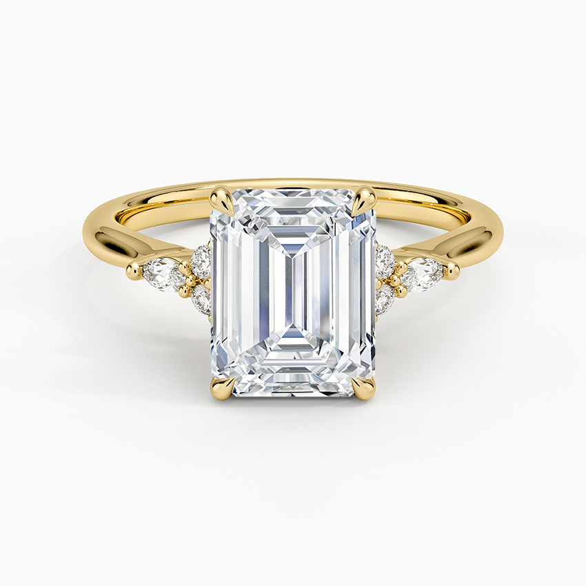 Emerald cut lab grown diamond ring in yellow gold with marquise tipped accent clusters, top view
