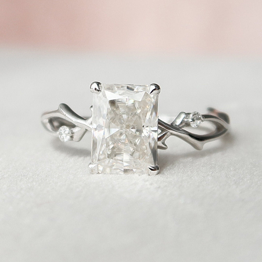 Radiant cut lab grown diamond ring on a carved twig and vine band