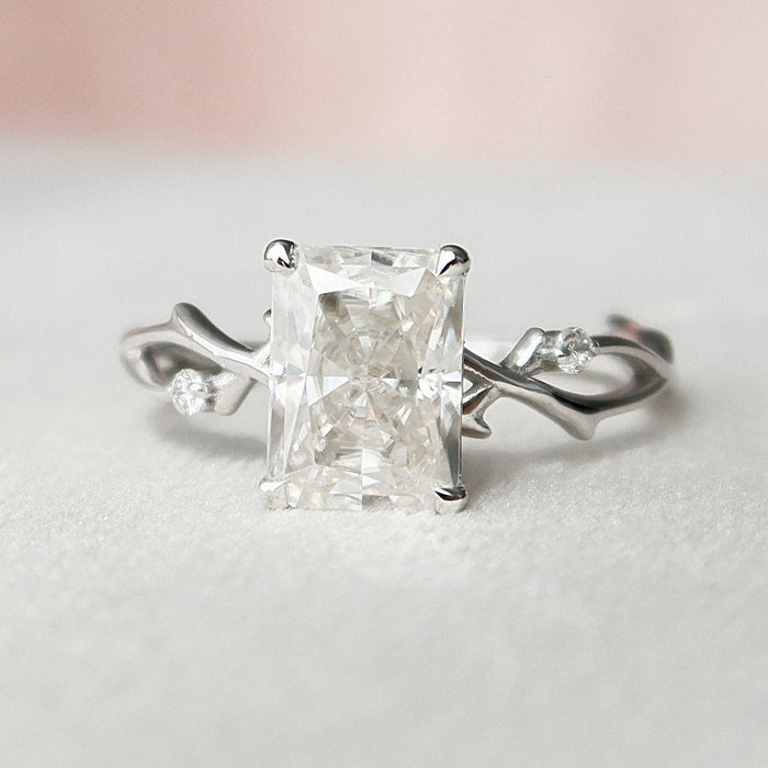Radiant cut lab grown diamond ring on a carved twig and vine band