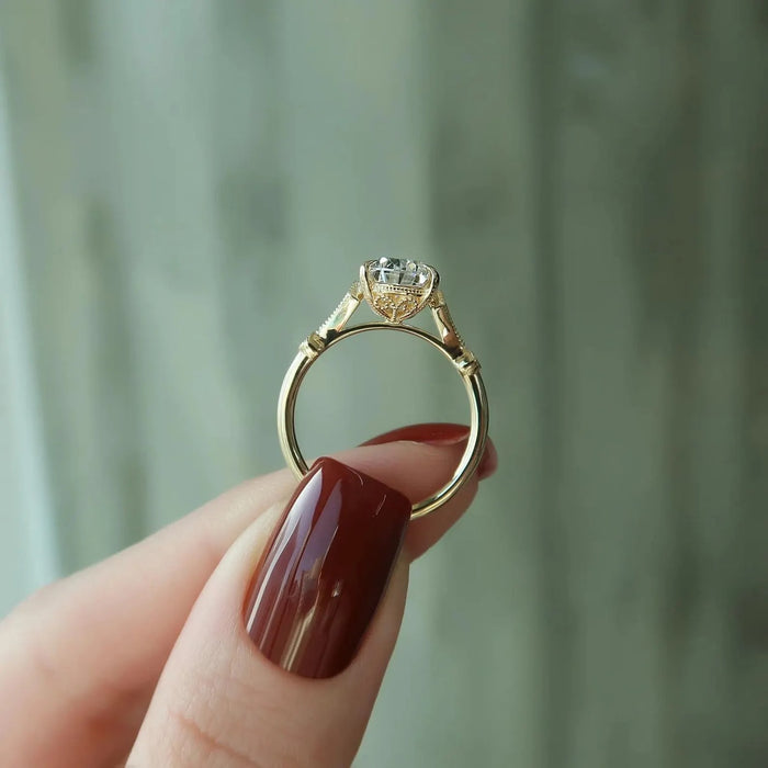 Profile of the elongated pear halo ring showing the spaced band accents