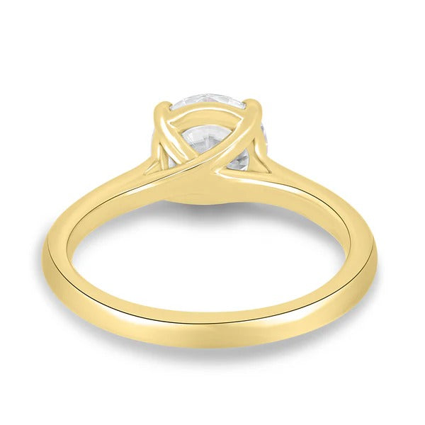 Four claw cathedral round cut diamond solitaire engagement ring