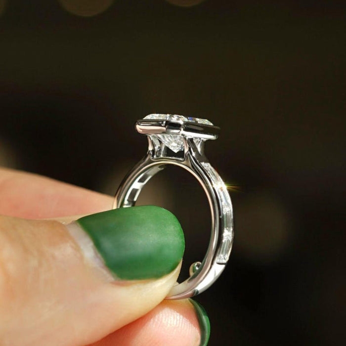 Radiant cut lab grown diamond bezel ring with channel set baguettes