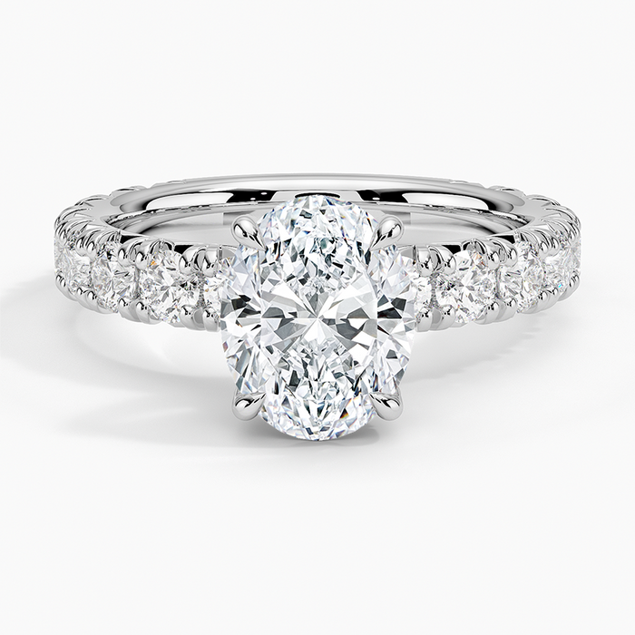 Oval cut lab grown diamond ring with wide fishtail pave shoulders in white gold, top view
