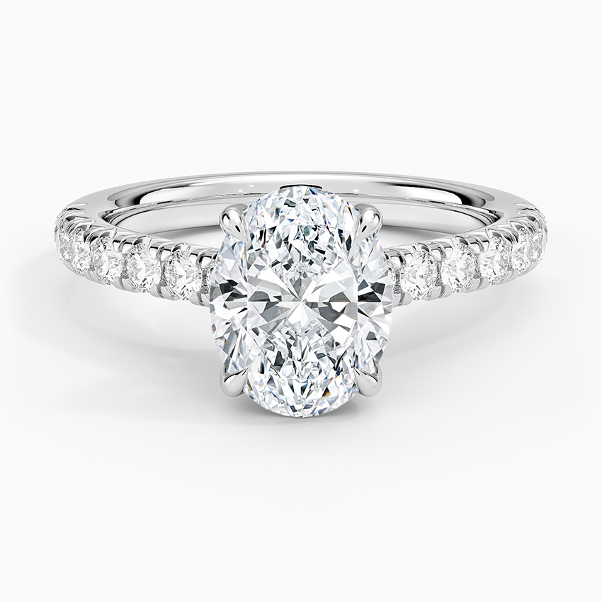 Oval cut lab grown diamond ring with a trellis gallery and slim fishtail pave in white gold, top view