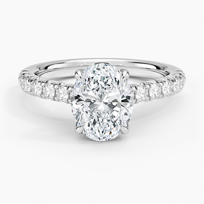Oval cut lab grown diamond ring with a trellis gallery and slim fishtail pave in white gold, top view