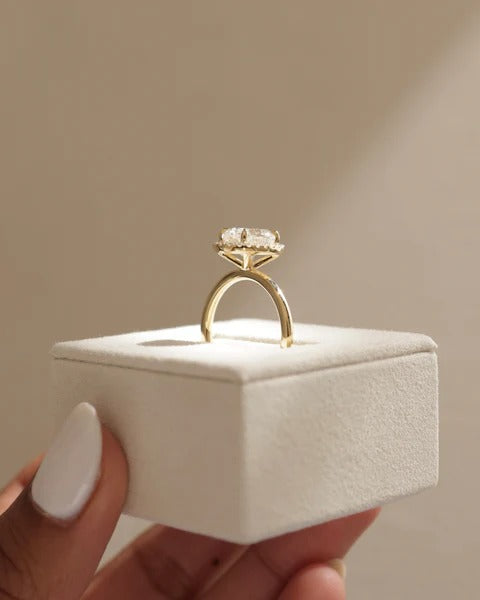 Oval cut diamond halo engagement ring