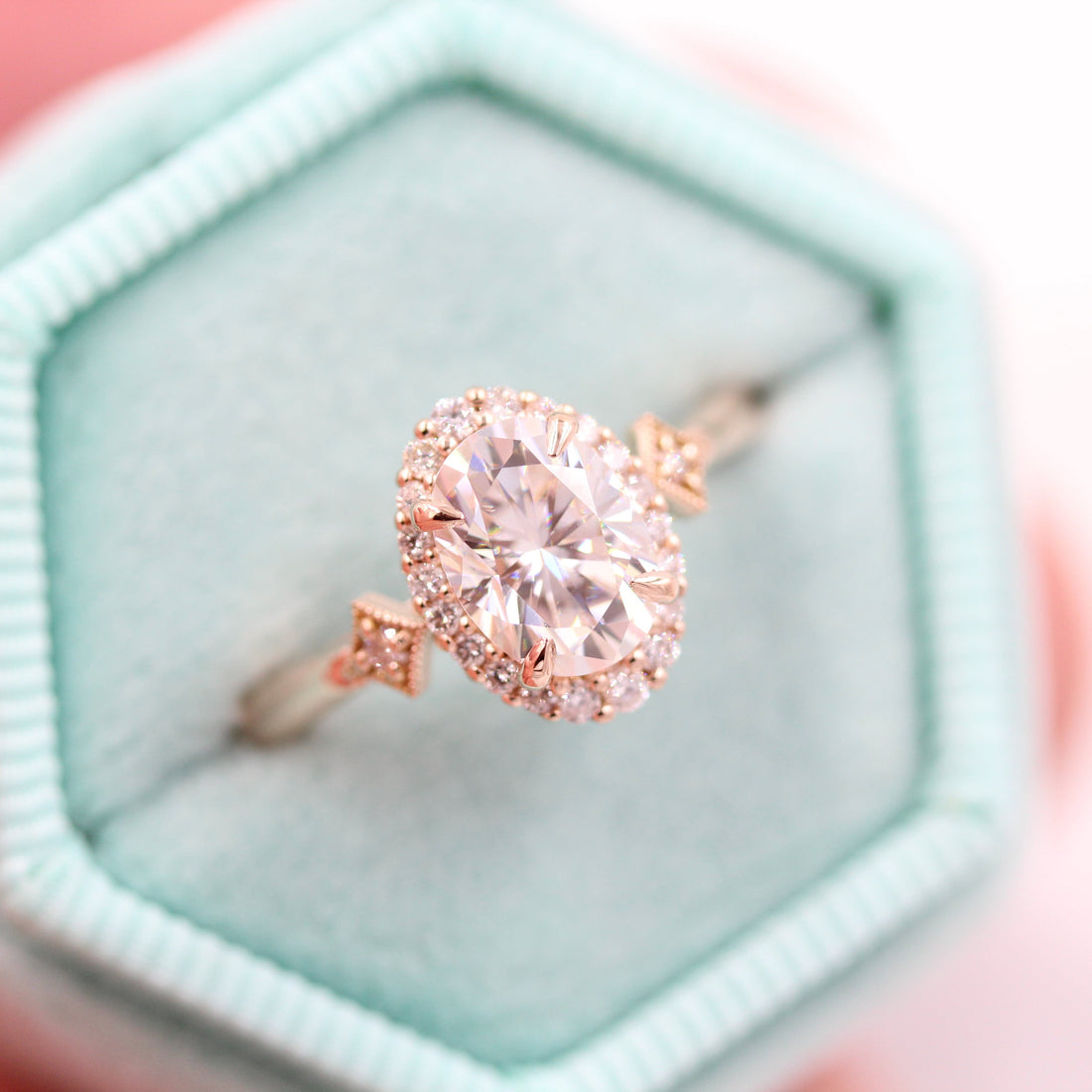 Oval lab grown diamond vintage halo ring with bullet cut accents