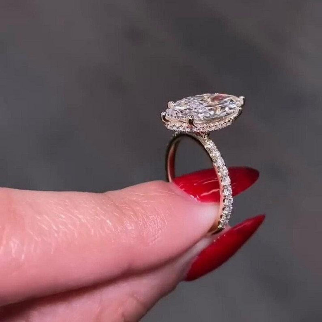 V prongs protecting the pointed tips of the marquise lab grown diamond