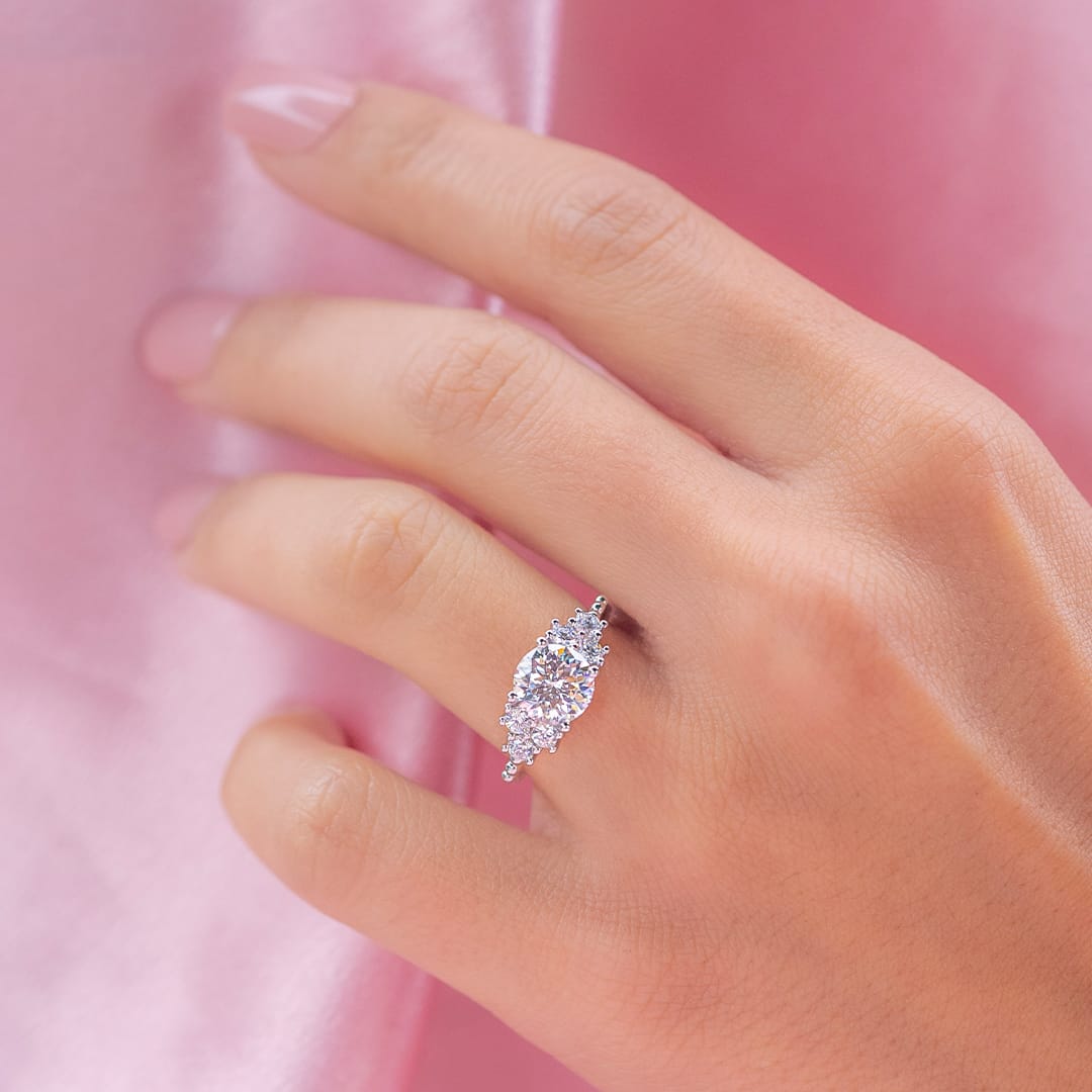 Round lab grown diamond graduated cluster engagement ring