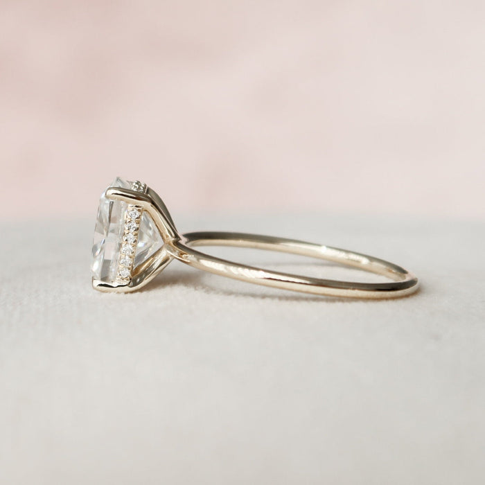 Cushion cut lab grown diamond ring with concealed halo on a tapered wire band