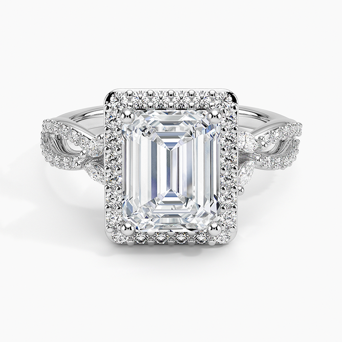 Emerald cut lab grown diamond ring in white gold with rectangular pave halo and twisted vine shoulders, top view