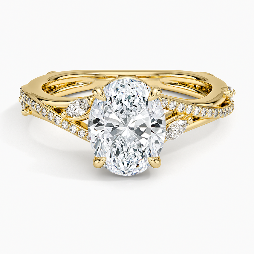 Oval cut lab grown diamond ring on a split shank with marquise bridges in yellow gold, top view