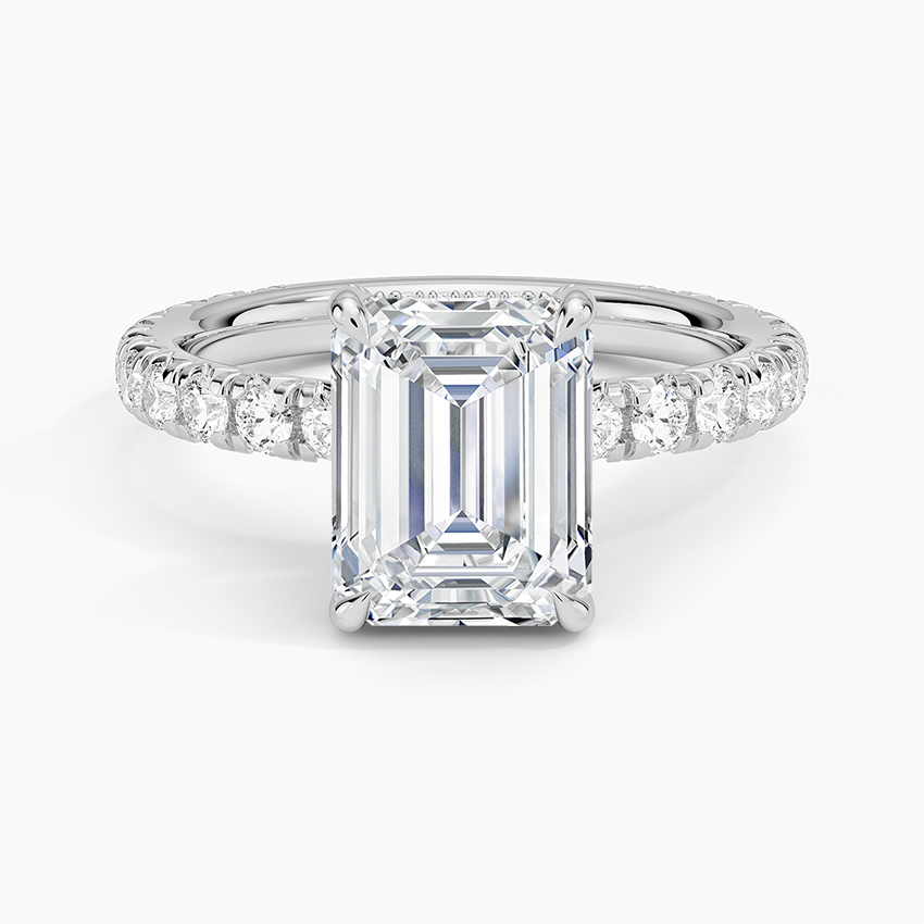 Emerald cut lab grown diamond ring in white gold with a wide French pave band, top view