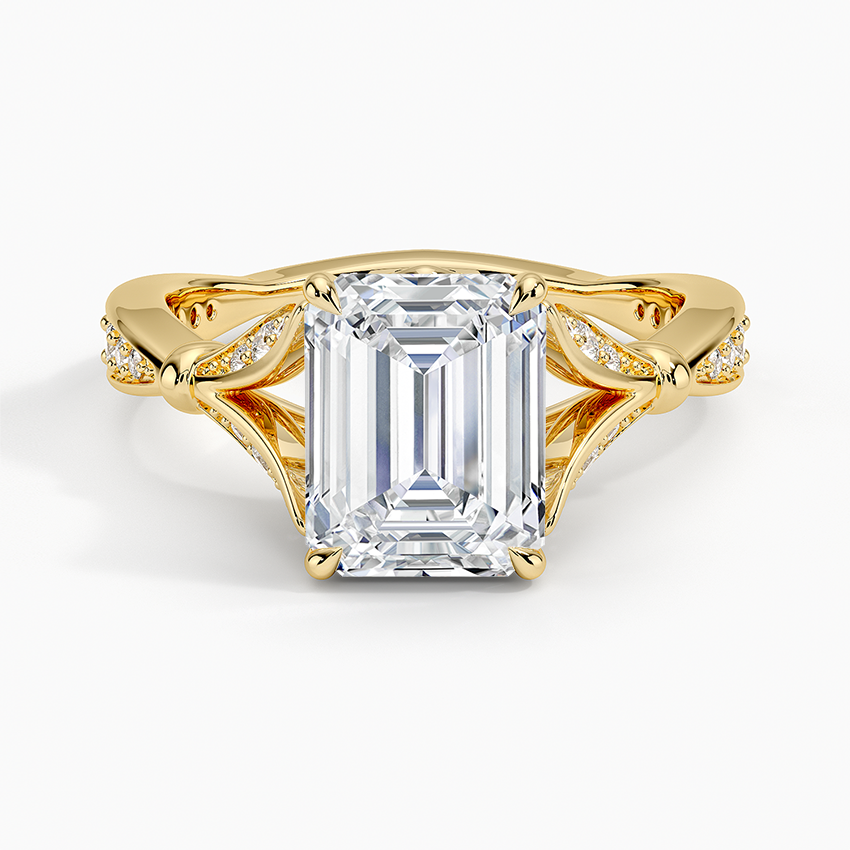 Emerald cut lab grown diamond ring with sculpted pave leaf petal shoulders in yellow gold, top view