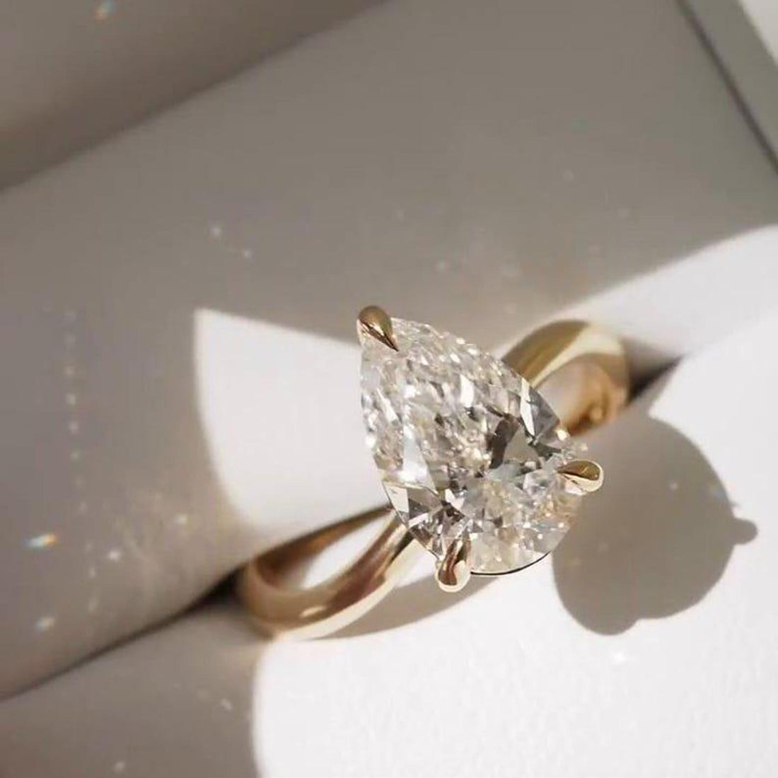 Elegant pear cut lab grown diamond solitaire ring