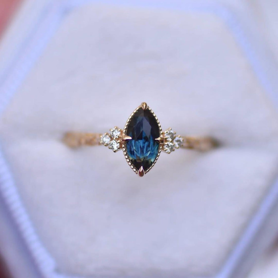 London Blue Topaz marquise cut engagement ring