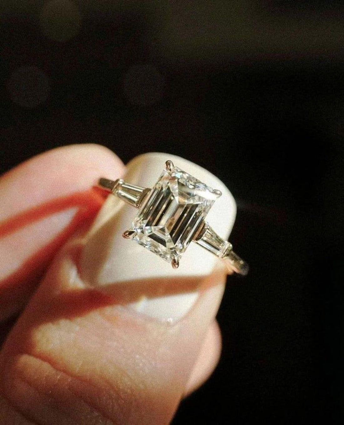 Emerald cut lab grown diamond baguette three stone anniversary ring