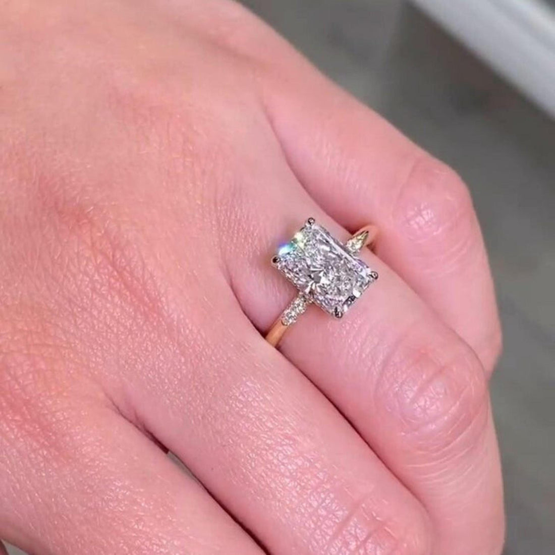 Radiant cut lab grown diamond hidden halo ring with sparkling pave shank