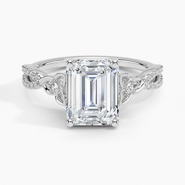 Emerald cut lab grown diamond ring in white gold with woven pave links and round side accents, top view