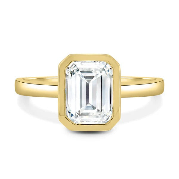 Bezel set emerald cut diamond solitaire engagement ring