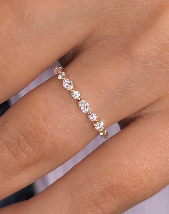Marquise and round eternity wedding band from the radiant halo bridal set