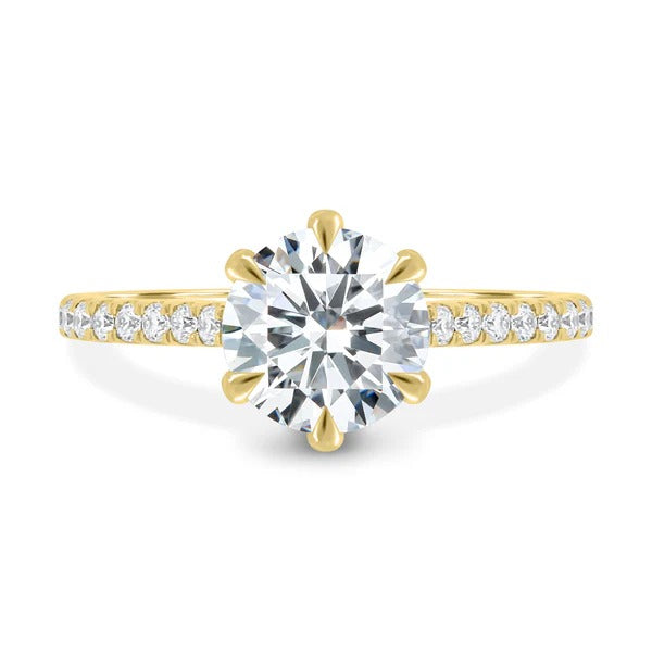 Six claw round solitaire engagement ring detail
