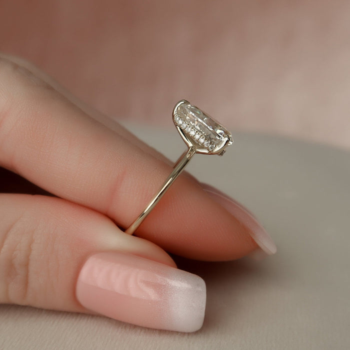 Elongated pear lab grown diamond engagement ring viewed from above