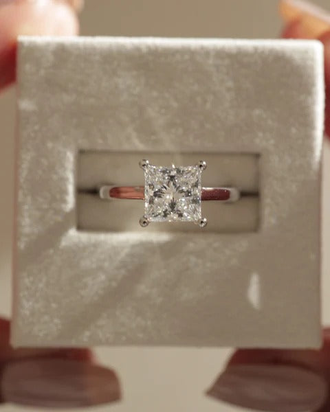 Four claw princess cut diamond solitaire engagement ring