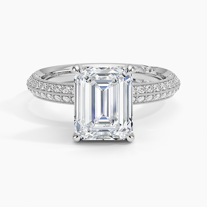 Emerald cut lab grown diamond ring with triple row milgrain pave shoulders in white gold, top view