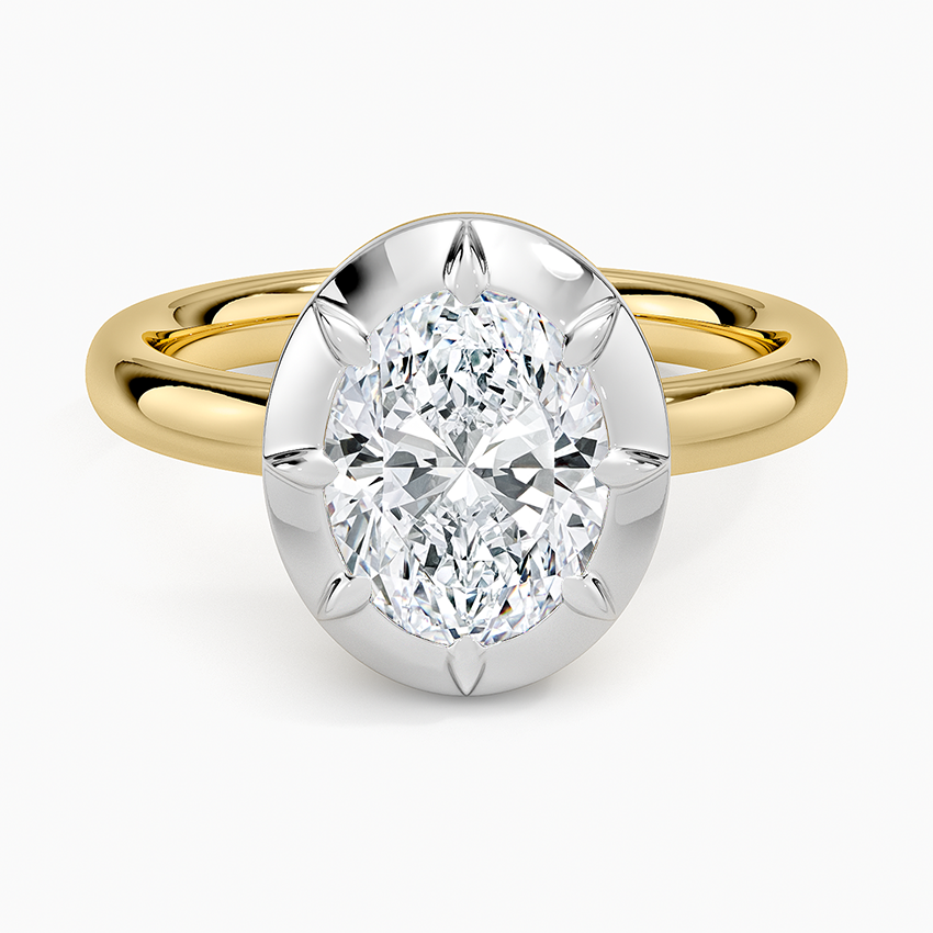 Oval cut lab grown diamond in a two tone halo plate with petal claws, top view