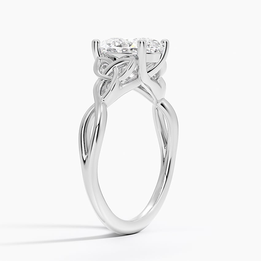 Oval cut lab grown diamond ring with Celtic knot woven shoulders in white gold, profile view