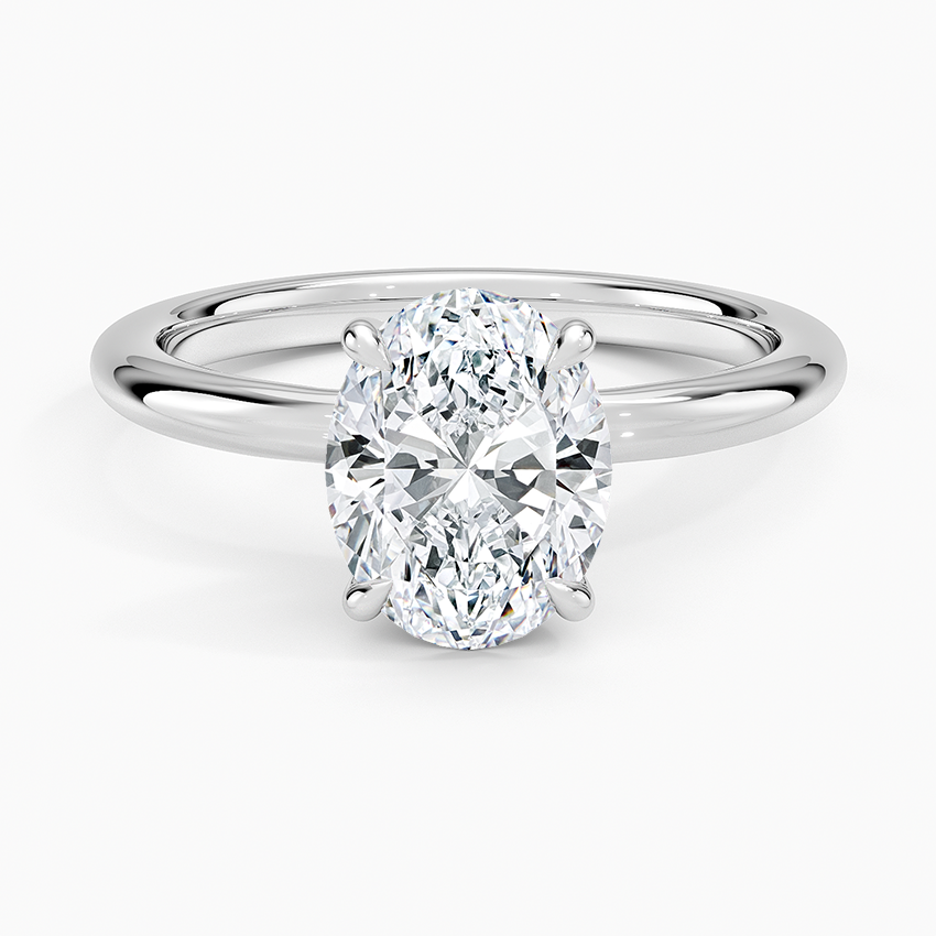 Oval cut lab grown diamond solitaire ring with split slit shoulders in white gold, top view