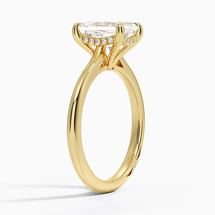 Side profile showing the hidden pave halo and split tulip gallery under the centre stone