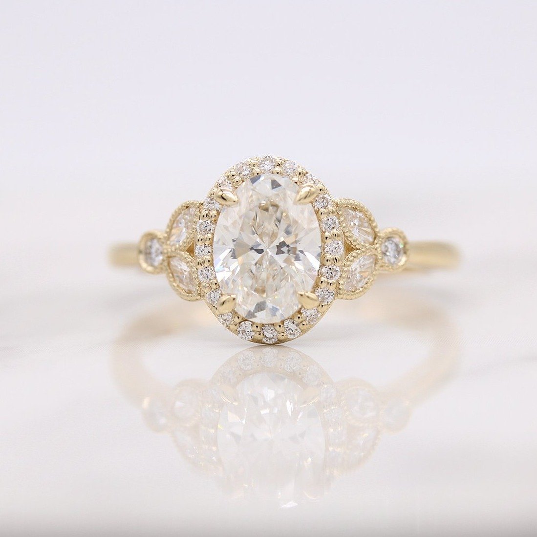 Oval lab grown diamond vintage filigree halo engagement ring