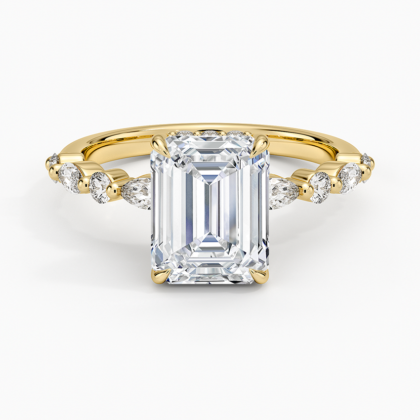 Emerald cut lab grown diamond ring in yellow gold with alternating marquise and round accents, top view