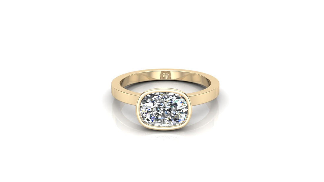 Elongated cushion lab grown diamond east west bezel engagement ring