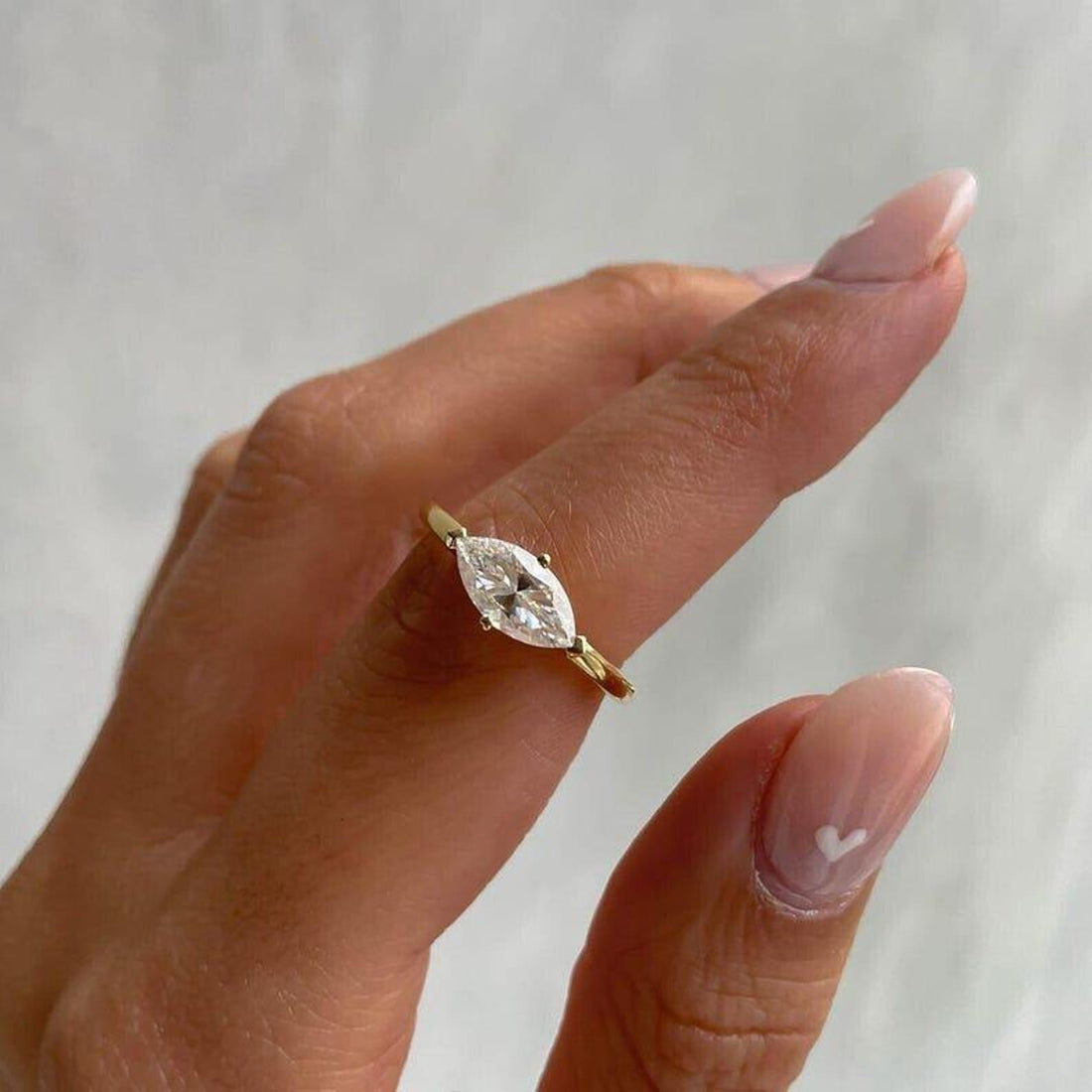 East west marquise cut lab grown diamond ring with plain band