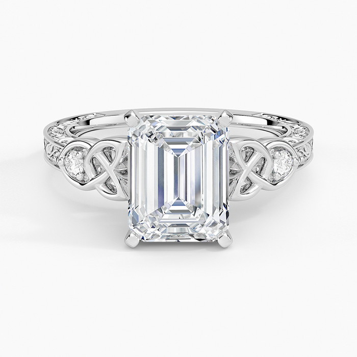 Emerald cut lab grown diamond ring in white gold with Celtic knot shoulders and round side diamonds, top view