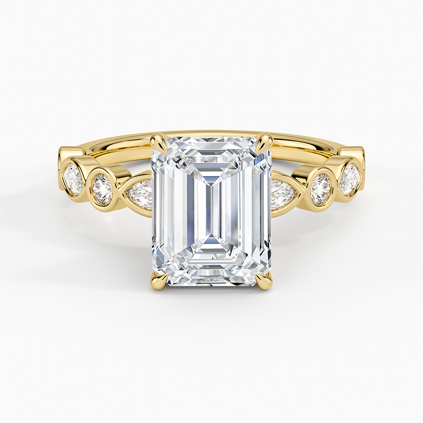 Emerald cut lab grown diamond ring with bezel set marquise and round accent band in yellow gold, top view